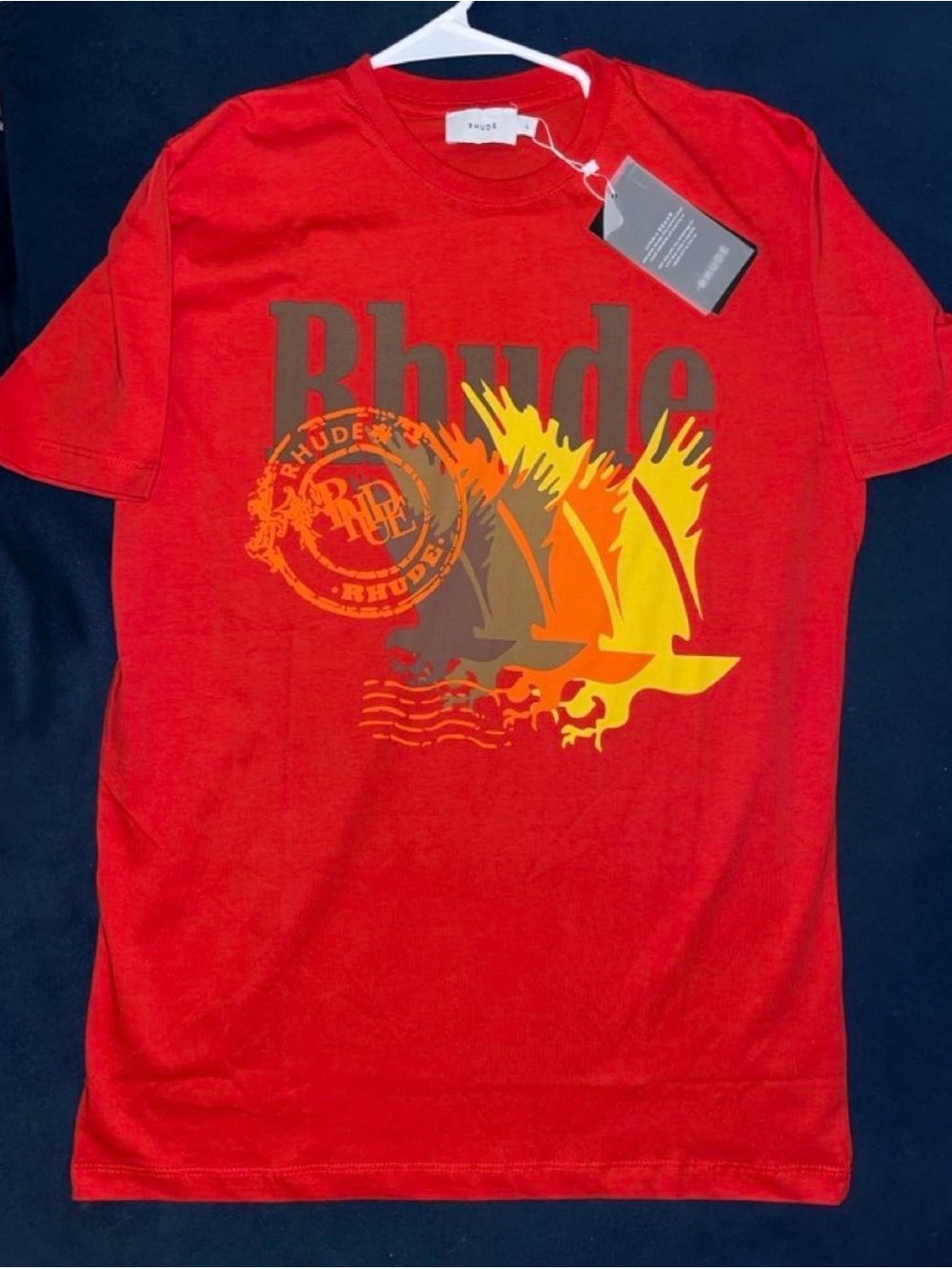Rhude Red Graphic Tee with Yellow & Orange Sail Motif